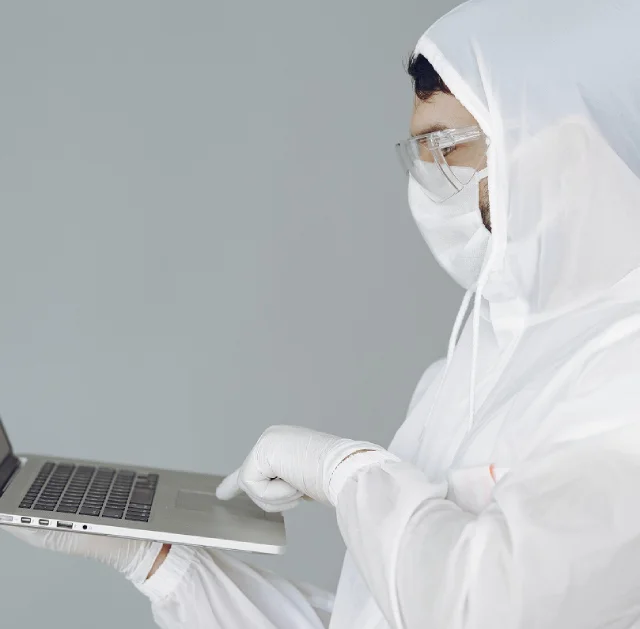 doctor-in-protective-gear-using-laptop-data-security-ciphertex-data-security-los-angeles-county