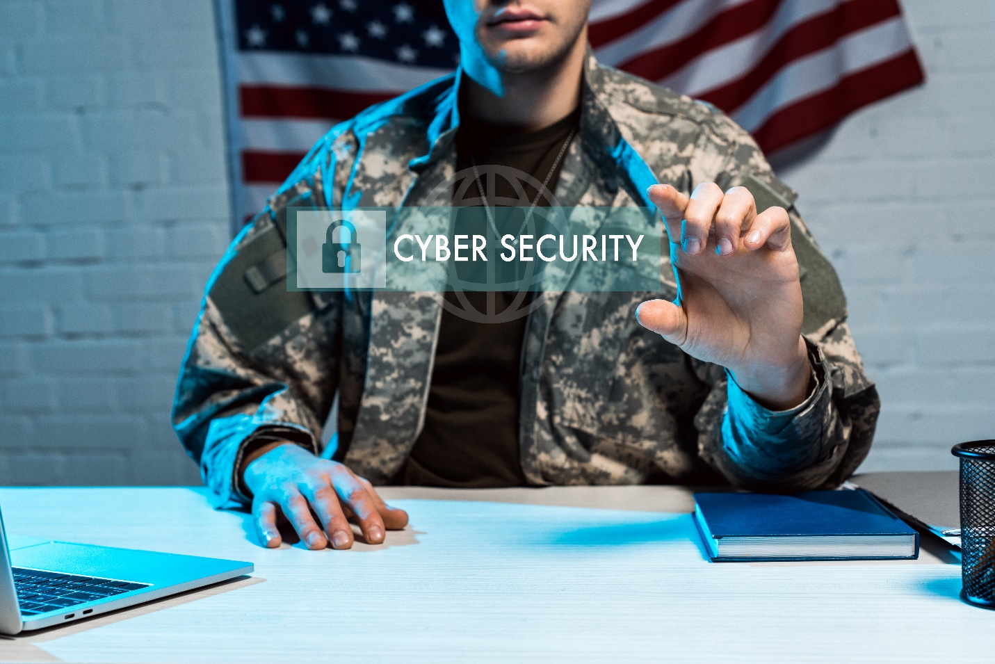 military man in uniform gesturing near cyber security lettering in address bar