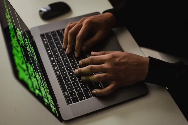 male-hacker-typing-data-security-ciphertex-calif